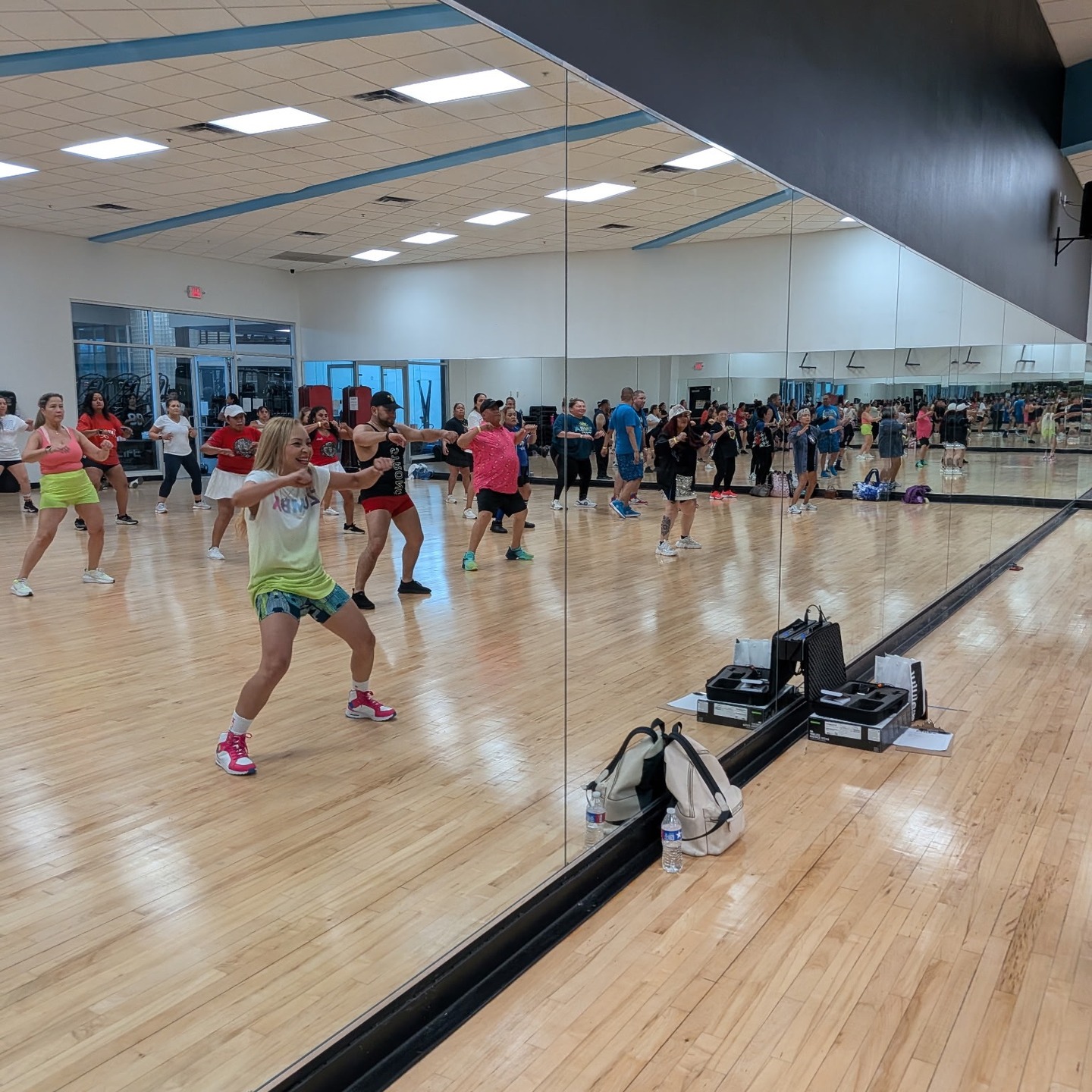 Zumba aerobics master class (instructor Karen) at FIT LIFE Houston — real photo from Instagram post https://www.instagram.com/p/DW9Jus3llIH/?img_index=1 (sourced from @fitlife_houston and other location accounts Auburn @fitlife_au, North Charleston @fitlife.hc, Columbus)
